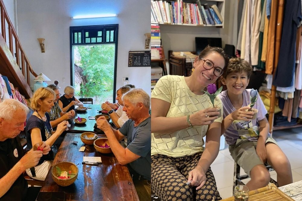 Des touristes fabriquent des fleurs en papier chez Lavin à Hué